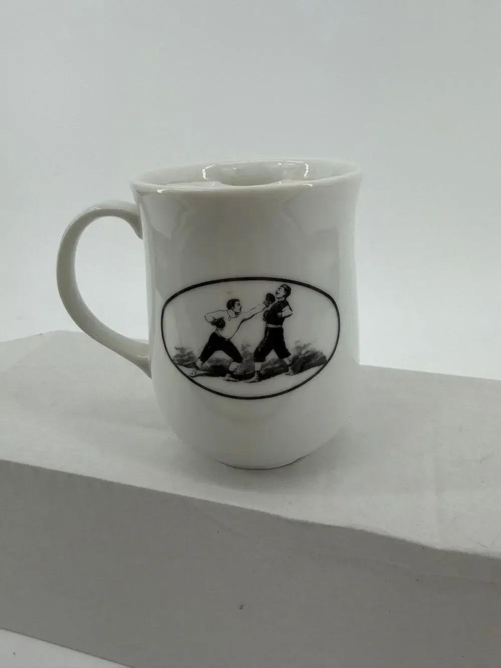 Porcelain coffee mug, Victoriana Collection The Strongman